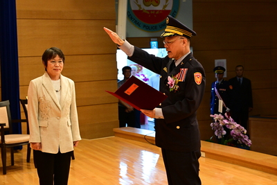新任校長由原任國家安全局副局長黃明昭出任